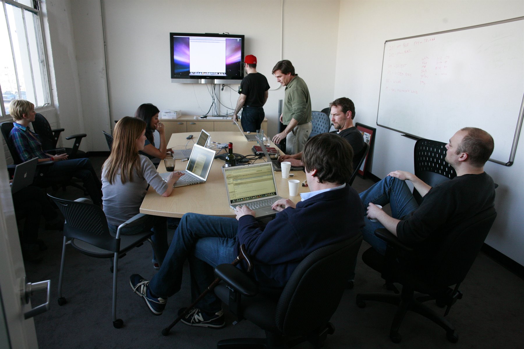 Boardroom and founder meeting representing AI startup governance and strategic oversight.