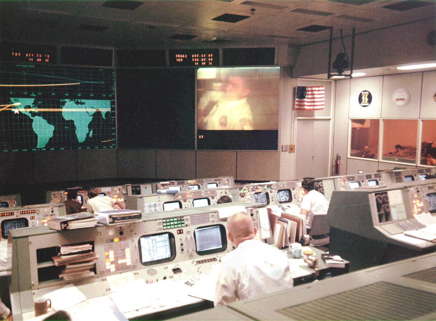 Mission operations control room with teams and consoles, representing simulation and world-model operations.