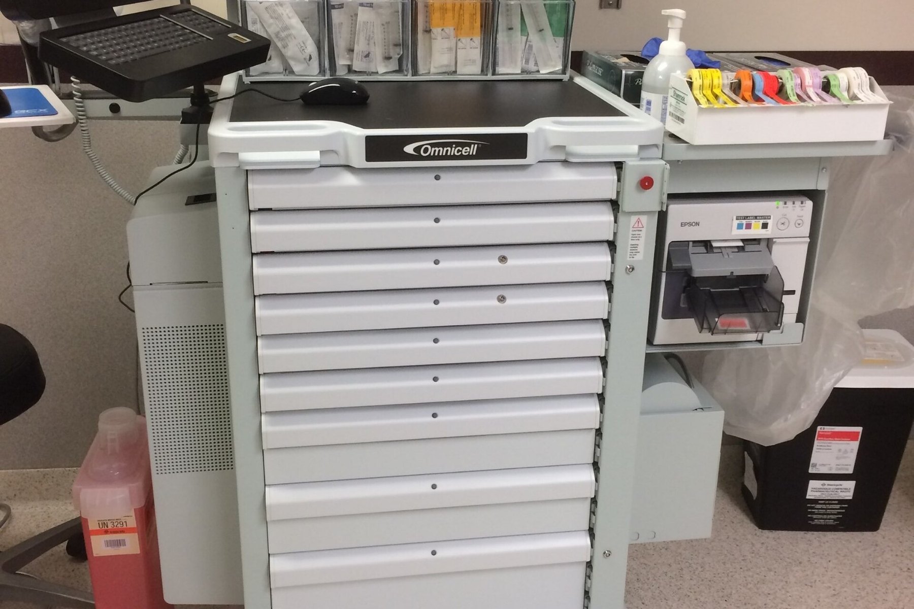 Clinical workstation and medical equipment inside a hospital operating environment.